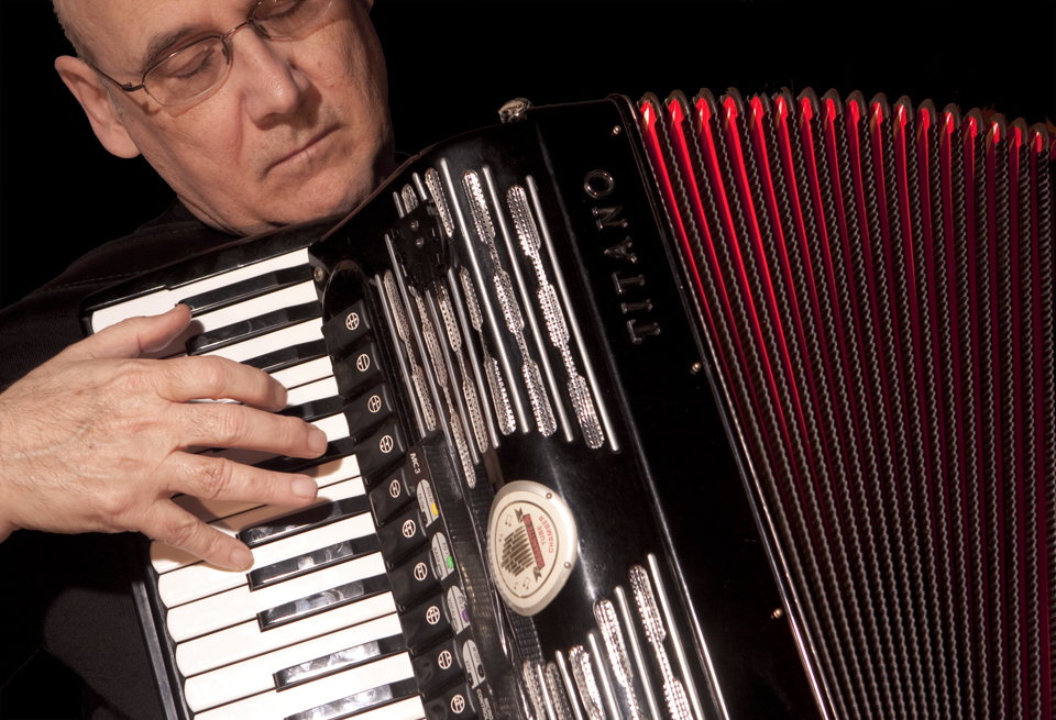 A person playing the accordion.