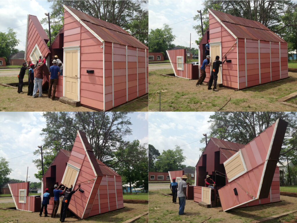 Four images of the outside shell of a small building being folded down.