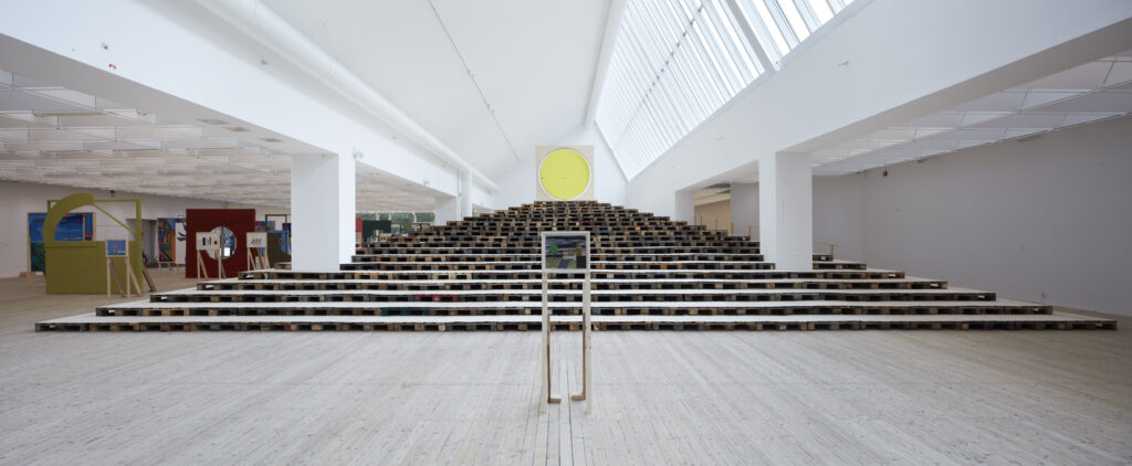 A large stepped installation in a gallery.