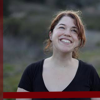 A portrait of a person outdoors with a partial red frame around two sides of the image.