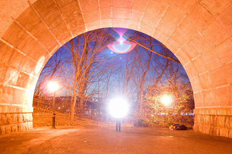 A tunnel lit up with light.