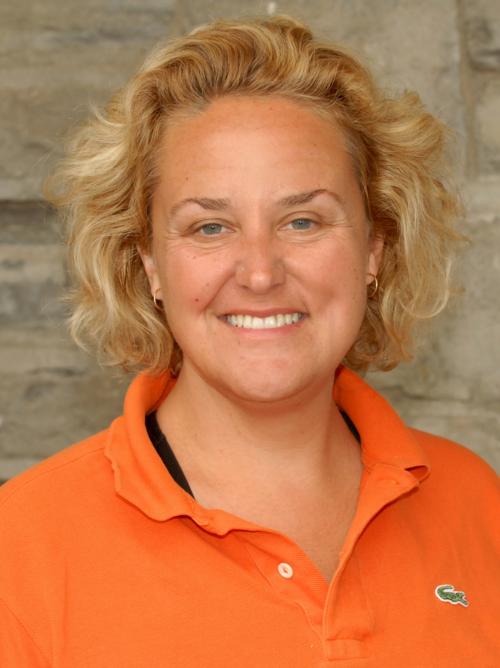 A portrait of a person against a textured background.