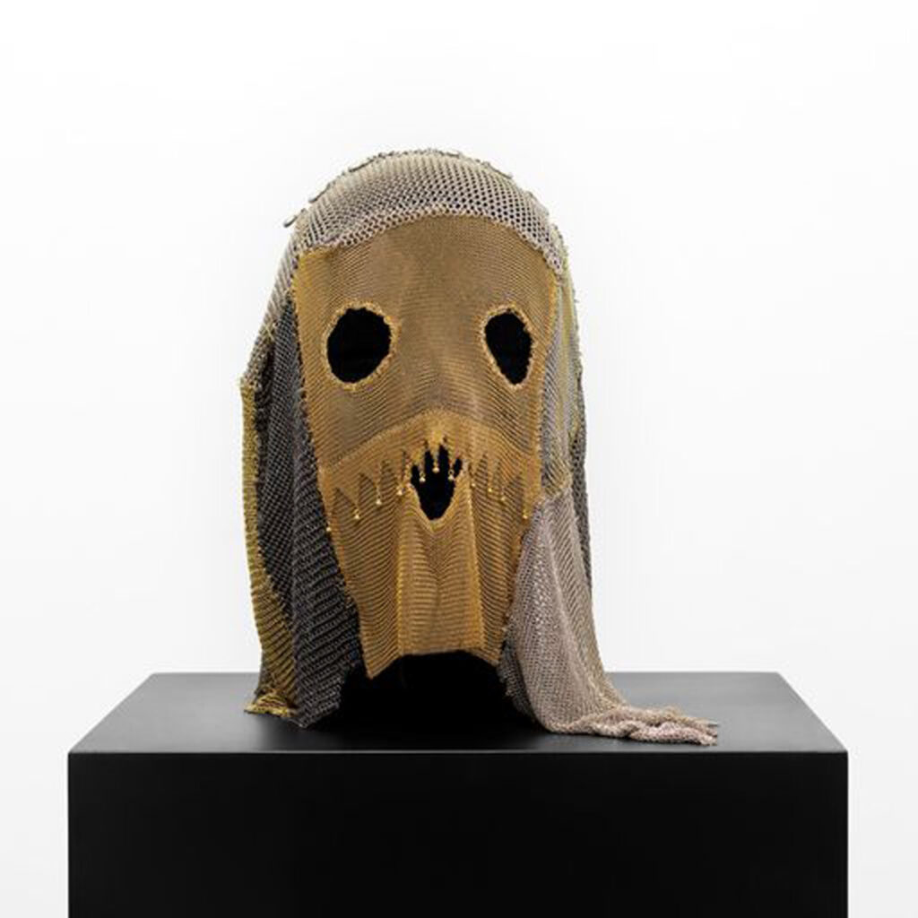 A droopy mask on a stand