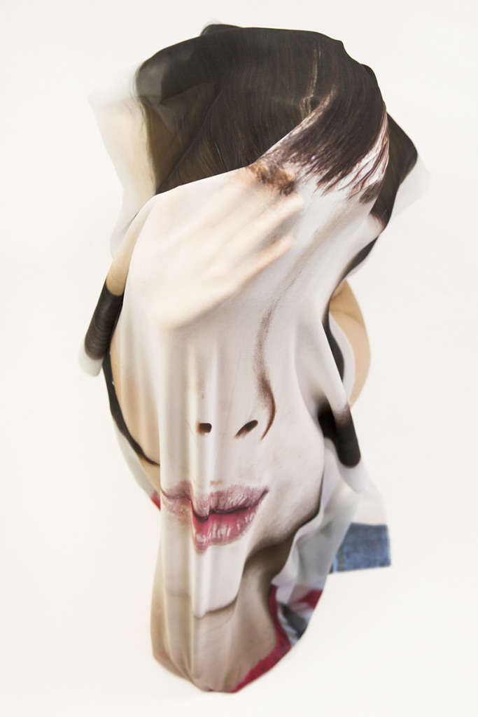 loose hanging fabric printed with a face
