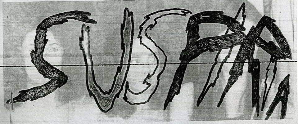 A grey scale image in the background with jagged hand-written text in the foreground reading 