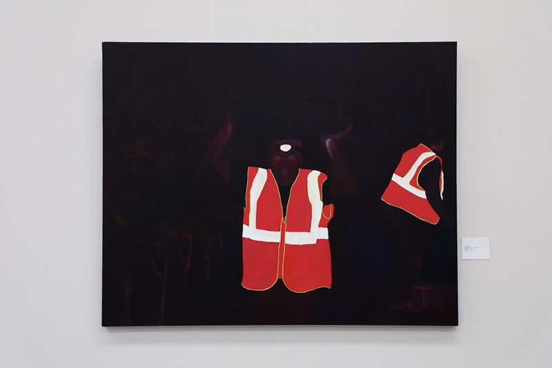 Painting in hues of orange and red on black of figures in reflective vests