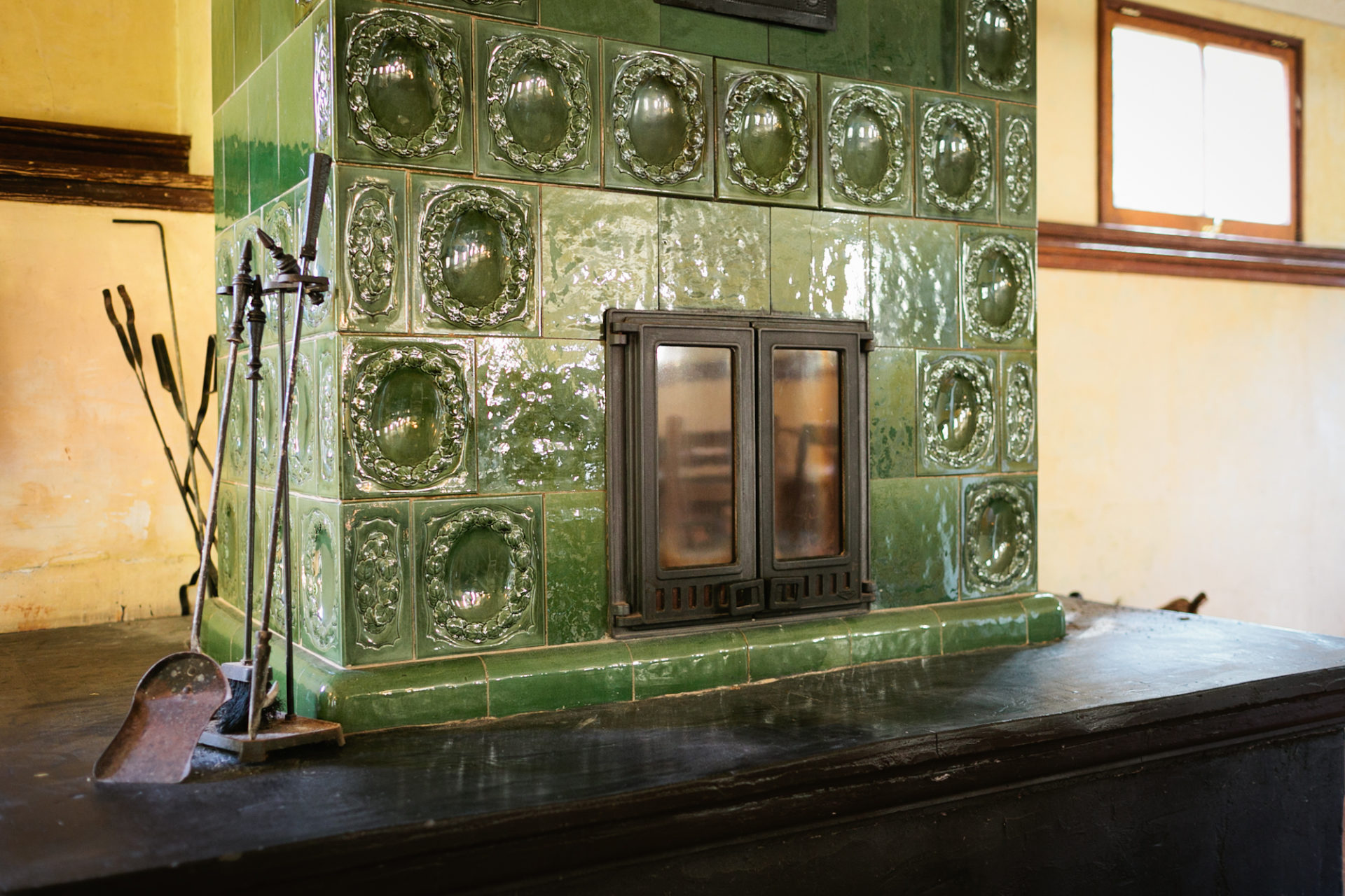 A large green fireplace