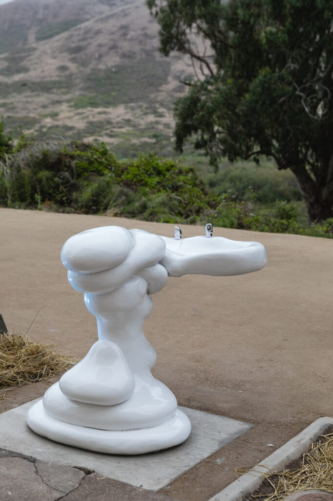 A lumpy drinking fountain