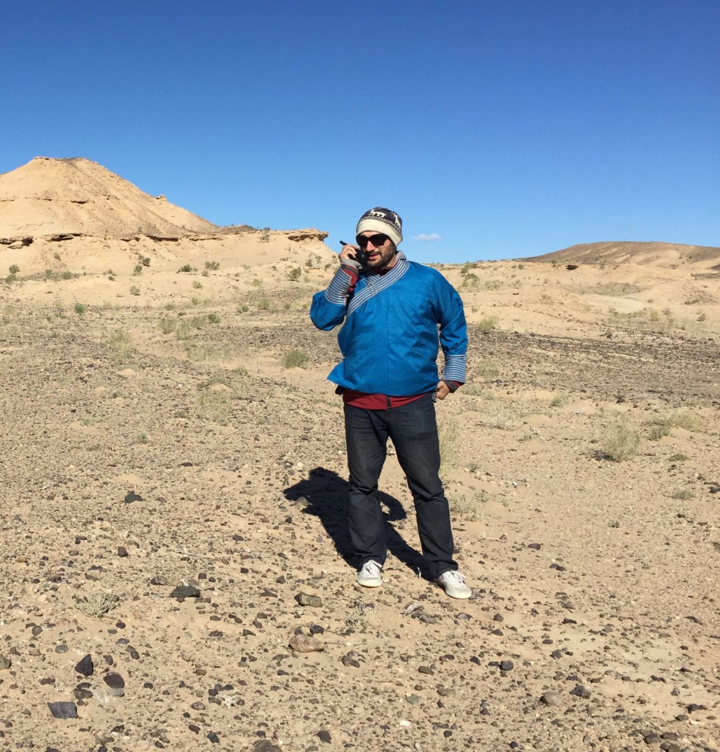 person standing in a desert landscape