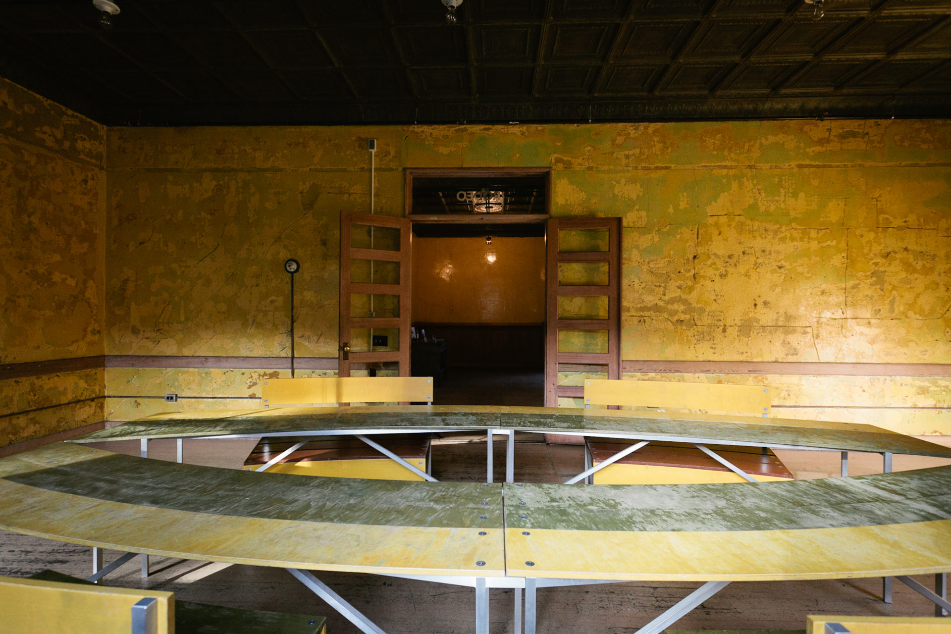 A room with an oval table