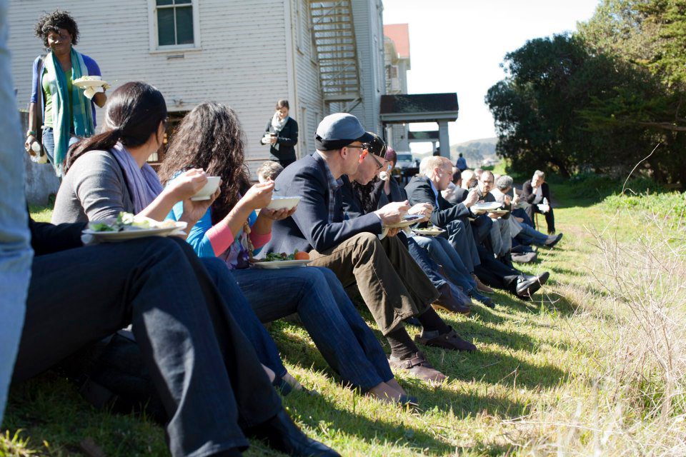 People sitting eating outside