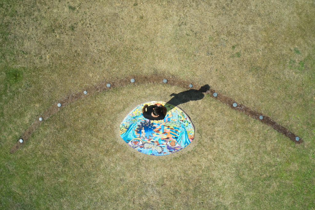 aerial view of a person standing on a colorful marker