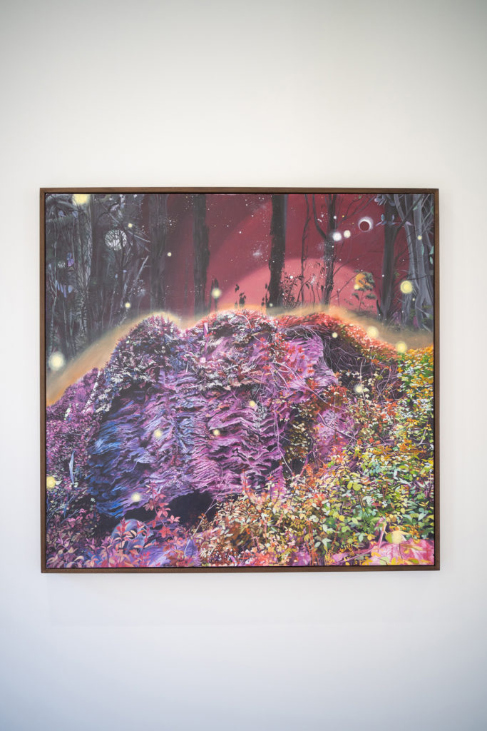 A painting of a pruple rock surrounded by trees and fireflies
