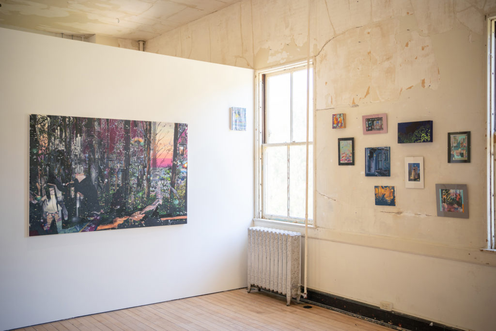 Paintings on a wall around a window