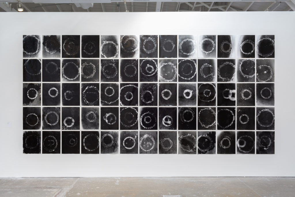 A grid of photographs or rings