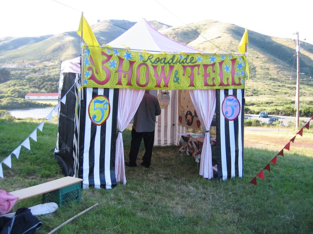 A circus tent with a sign that says Show and Tell