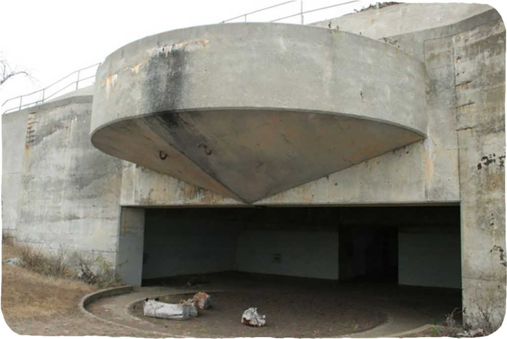 A large concrete bunker set into a hill