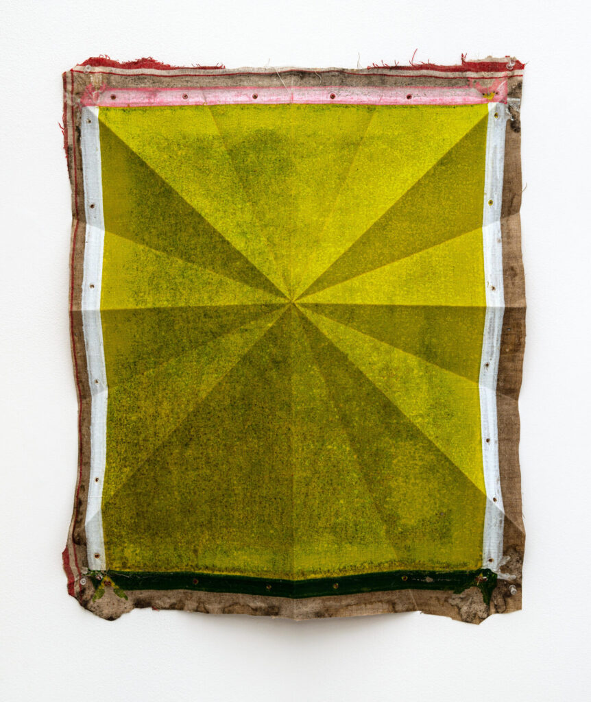 A painting on un-stretched linen, with an unpainted edge, white and black bars, and a grey-yellow rectangle in the center with radiating lines from folds.