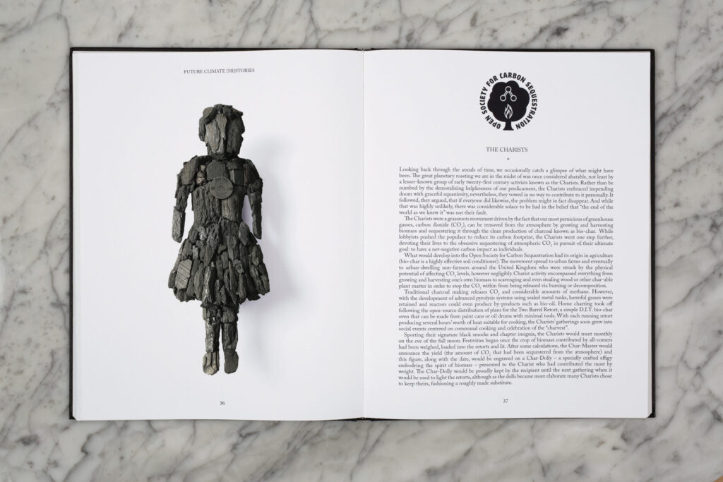 Book spread with an image of a doll or figure made out of black material, with text on facing page.