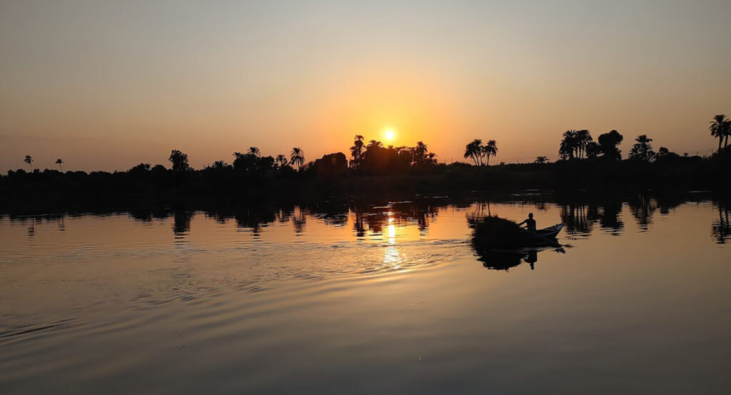 A sunset over a river