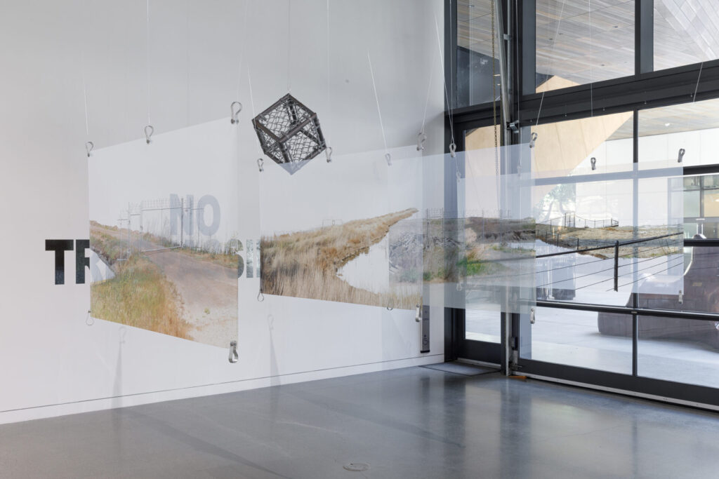 Photos printed on transparency suspended in space.